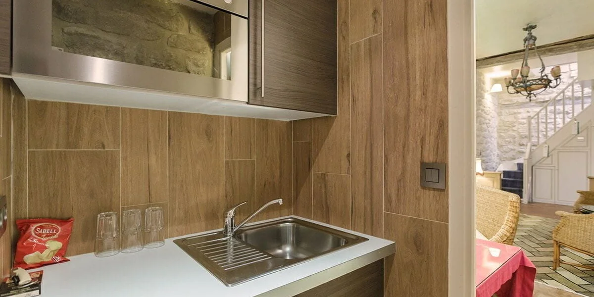 Kitchenette in the Duplex Suite Kitchenette area in the duplex suite of the hotel La Perle in Paris